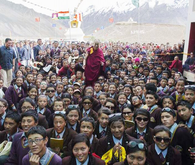 His Holiness, the Dalai Lama, visiting Lamdon Model High School in Northern India in 2014.